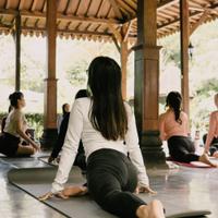 group practicing yoga