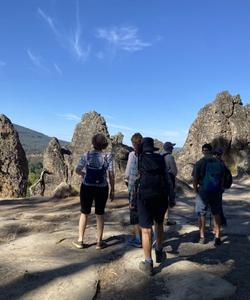 rocky mountain with tourists
